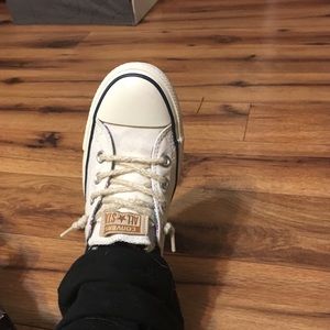 Cream converse shoes